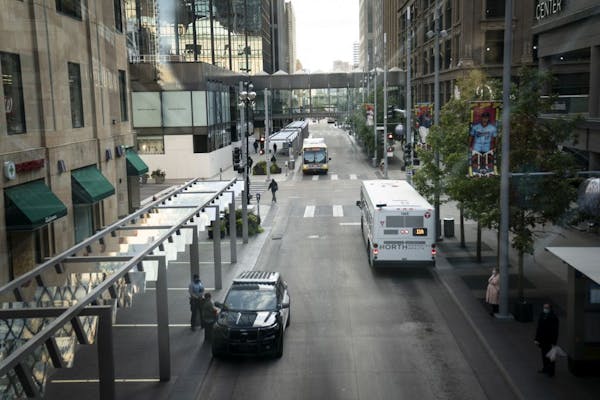 Police patrolled Nicollet Mall in vehicles in downtown Minneapolis, Minn., on Friday, October 2, 2020.