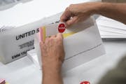 Mail-in ballot packages were prepared in July in Minneapolis. More than 1 million Minnesota voters have requested absentee ballots.