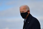 Joe Biden, the Democratic presidential nominee, wearing a face mask, arrives in Grand Rapids, Mich., on Friday, Oct. 2, 2020, to campaign. (Mark Makel