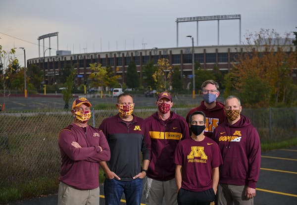 Tailgating friends (from left) Nathan Brown, Chris Joos, Greg Palattao, Erik Romslo, Peter Moran and Dave Just in Lot 37 outside the Gophers' stadium.