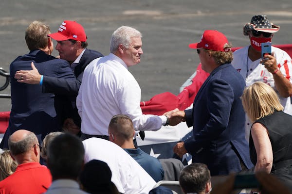 U.S. Rep. Tom Emmer of Minnesota greeted Republicans before President Donald Trump spoke in Mankato in August.