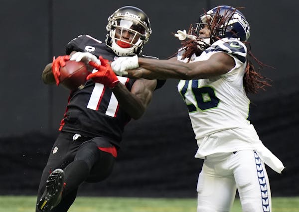 Falcons wide receiver Julio Jones, left, got the OK to play this week after dealing with a hamstring injury. He sat two of the past three weeks.