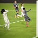 Colorado Rapids defender Lalas Abubakar, left, headed a ball past goalkeeper William Yarbrough in the 89th minute for the deciding goal in the Loons�