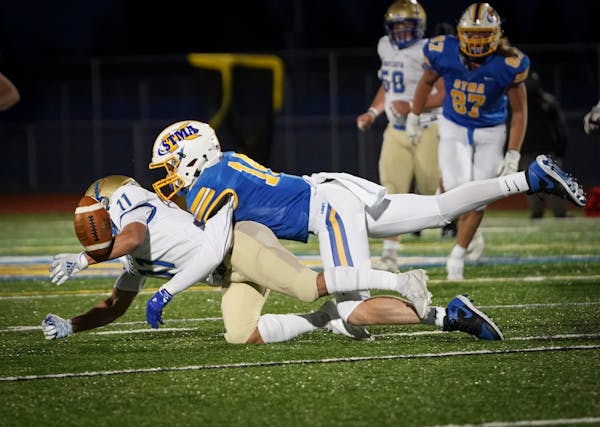 Two top-10 teams, St. Michael-Albertville (in blue, shown against Wayzata on Oct. 13) and Champlin Park, went from having their regularly scheduled co