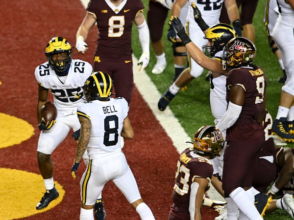 Michigan running back Hassan Haskins celebrated a second-quarter touchdown against the Gophers.