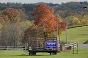 A Trump/Pence sign on a hay wagon in Freeport, Pa., on Oct. 15. U.S. farmers have received a record $40 billion in aid in 2020 from the federal govern