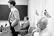 Bud Grant sat and listened to new Vikings coach Les Steckel's remarks in a news conference at Winter Park on Jan. 31, 1984.