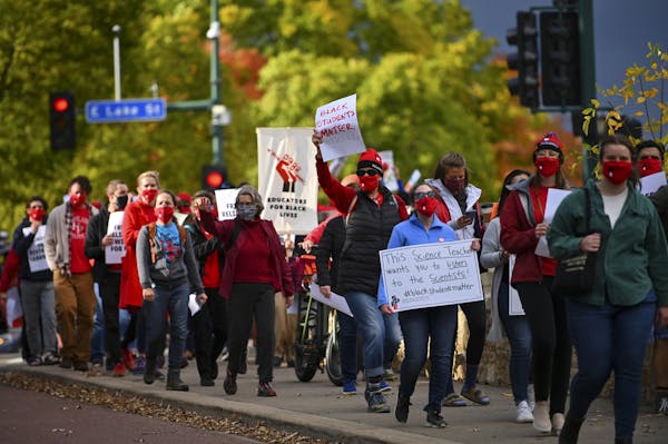 St. Paul educators and supporters converged with their Minneapolis counterparts in Minneapolis off the Lake Street-Marshall Bridge for a rally in late