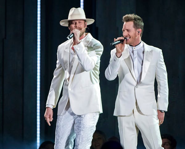 Brian Kelley, left, and Tyler Hubbard of Florida Georgia Line perform "Meant to Be" at the 52nd annual CMA Awards in Nashville on Nov. 14, 2018.