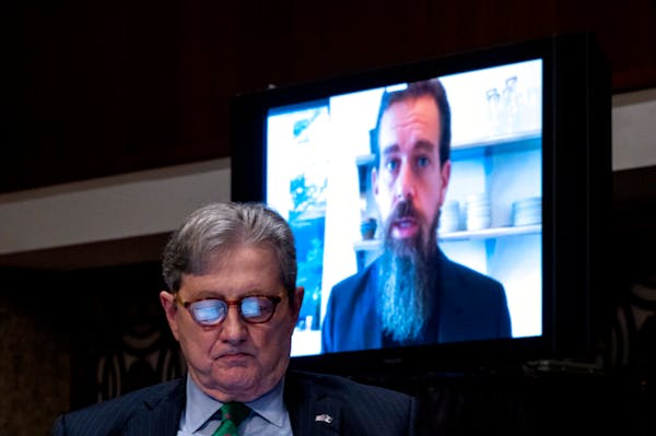 Sen. John Kennedy, R-La., listens as Twitter CEO Jack Dorsey testifies remotely during a Senate Judiciary Committee hearing on Facebook and Twitter's 