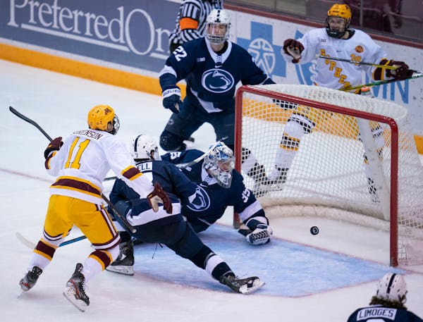 Jonny Sorenson (11) began to celebrate after he lifted a rebound past Penn State goaltender Oskar Autio in the second period