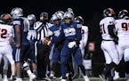 Teammates celebrated a first quarter touchdown by Champlin Park running back Shawn Shipman (23) against White Bear Lake. ] AARON LAVINSKY • aaron.la