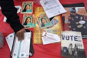 People picked up literature at an early voting celebration on Oct. 29, 2020, at the American Indian OIC in Minneapolis. Organizers helped boost Native