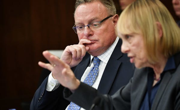 Ted Mondale and Michele Kelm-Helgen responded after Minnesota Legislative Auditor James Nobles delivered his report to the legislative committee at th