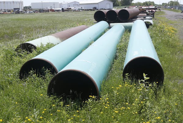 FILE - In this June 29, 2018, file photo, pipeline used to carry crude oil is shown at the Superior, Wis., terminal of Enbridge Energy. A significant 
