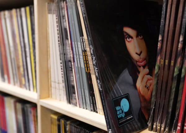 A vinyl copy of Prince’s album “One Night Alone” sat among the records in Noiseland Industries’ library.