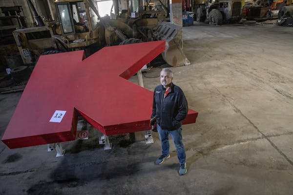 Casper Hill with the city of Minneapolis stood by the “K” from the Kmart on Lake Street in a city warehouse on Friday.