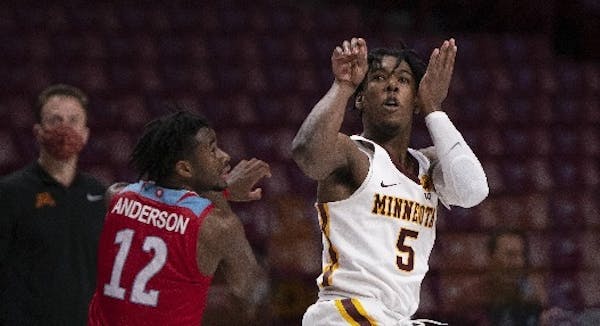 Carr stars again: Tie-breaking three pointer gives Gophers 67-64 win