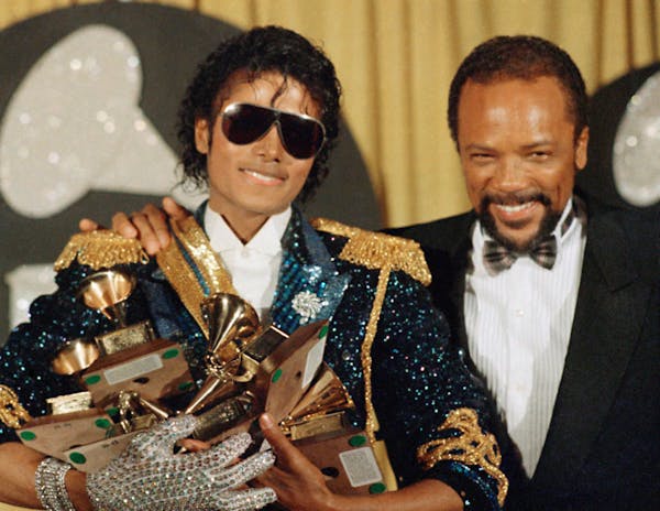 Michael Jackson, with producer Quincy Jones, swept the Grammy Awards in February 1984 to help set off pop music's biggest year.