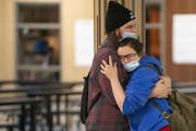 Gavin Lawrence embraced his girlfriend, Chace Johnson, in between classes at South Ridge School. It is one of only a few school buildings in Minnesota