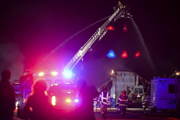 Firefighters battled a multiple-alarm industrial fire at a warehouse on Bass Lake Road on Tuesday in Maple Grove.