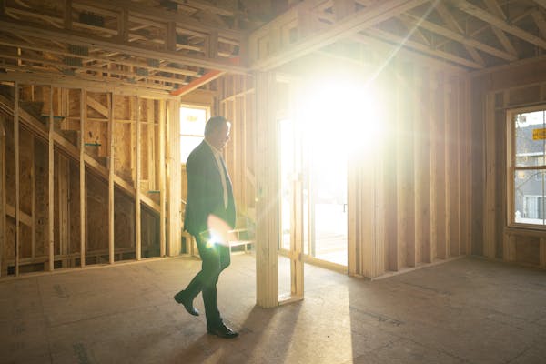Realtor Jim Schwarz in one of the townhouses under construction in his Sheldon Place development in Eden Prairie. Despite the pandemic, Twin Cities ho