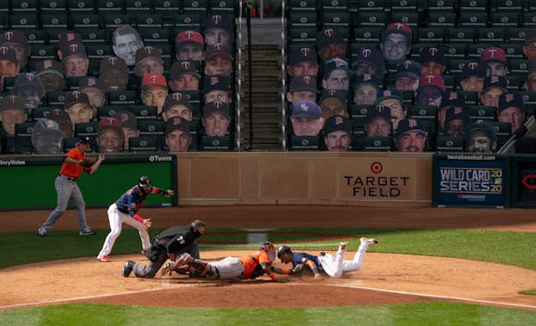 Twins second baseman Luis Arraez was tagged out at home during the team’s two-game playoff series with Houston a Target Field. The Twins played thei