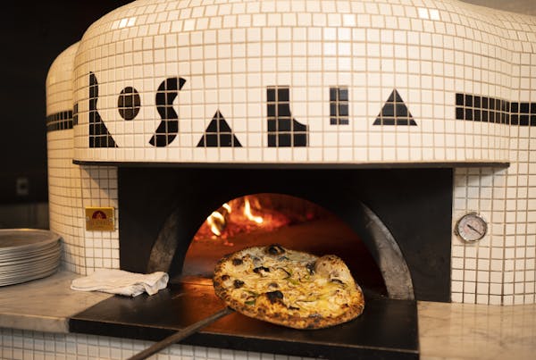 A funghi pizza emerged from the wood fired oven at Rosalia.   ]  JEFF WHEELER • jeff.wheeler@startribune.com Chef Daniel Dell Prado has opened a piz