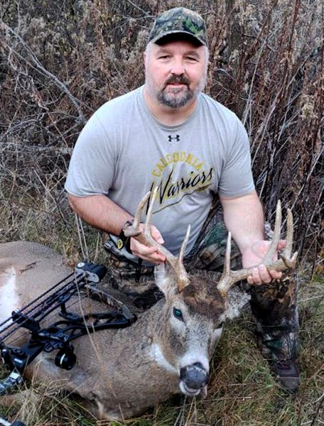 Craig Ihrke with a buck he arrowed this fall.