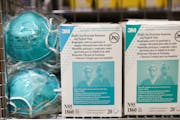 FILE — Masks that meet the N95 filtration standard in a storeroom at a hospital in Sarasota, Fla., on March 10, 2020. 