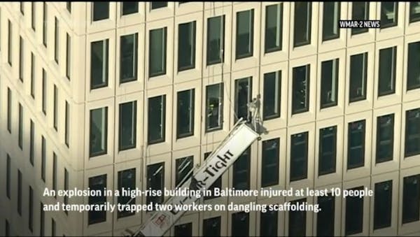 Scaffolding dangles after Baltimore building explosion