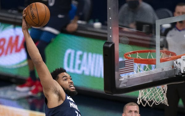 Karl-Anthony Towns went up for a dunk in the first half of Wednesday’s game.