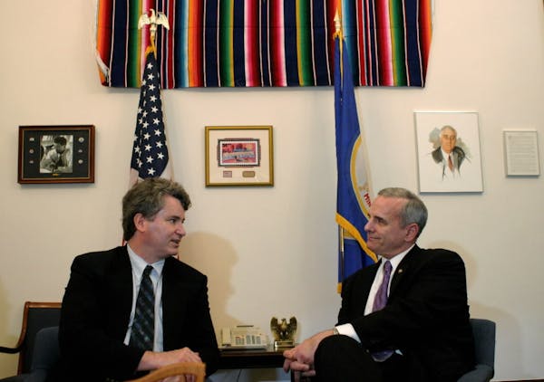 Mark Dayton, then a Minnesota Senator, speaks with Jon Pratt, executive director of Minnesota Council of Nonprofits, in 2003 in his Washington, D.C. o