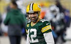Packers quarterback Aaron Rodgers smiled before last weekend’s game vs. the Panthers.