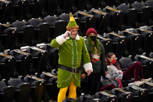 A Jazz fan — Utah is one of six NBA teams allowing fans in for home games — showed his Christmas spirit Saturday night.