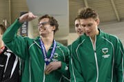 Keegan Duffy, left, was part of a relay team championship for Edina at the 2019 boys’ swimming state meet, and is trying to build his strength for a