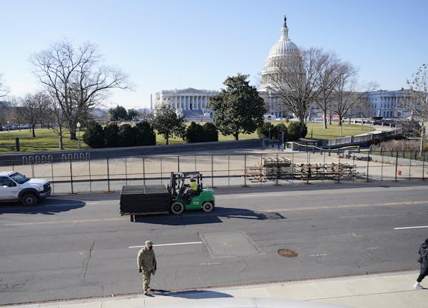 Fencing is placed around the exterior of the Capitol grounds, Thursday morning, Jan. 7, 2021 in Washington. The House and Senate certified the Democra