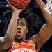 Illinois guard Ayo Dosunmu shoots during the first half of the team’s NCAA college basketball game against Northwestern in Evanston, Ill., Thursday,