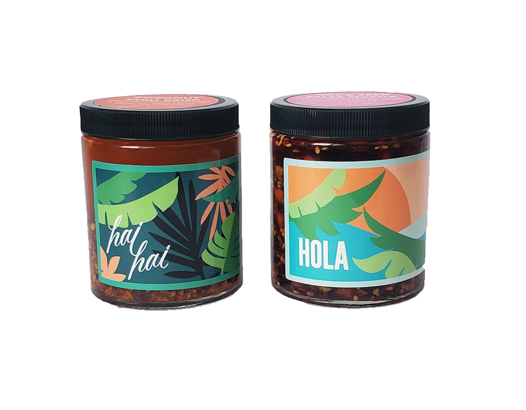 Hai Hai’sCoconut Chili Crisp Hola Arepa’s Nut & Seed Salsa Macha are part of a condiment set.
