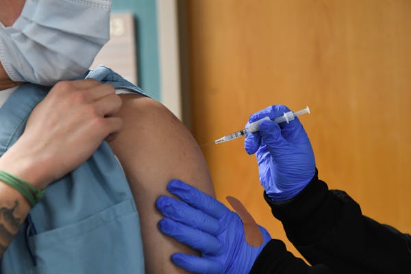 A Minneapolis VA Health Care System employee received a second dose of the COVID-19 vaccine.