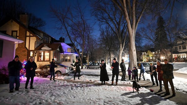 Minneapolis neighbors are 'singing through the hard times'