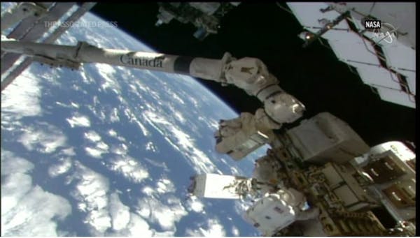NASA astronauts conduct spacewalk to upgrade Space Station