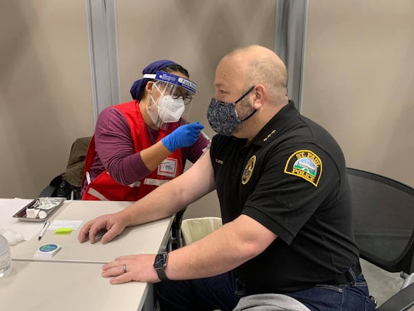 St. Paul Police Chief Todd Axtell received his first dose of the Moderna vaccine Wednesday along with other members of his department.