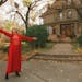 This photo taken in 1996 shows Mary Tyler Moore tossing her hat up as she revisits the Minneapolis Kenwood neighborhood house which was her television