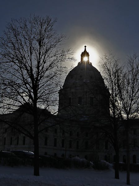 An extremely cold January day in 2014 produced a “sun dog” phenomenon, making for a dramatic backdrop for the State Capitol in St. Paul.