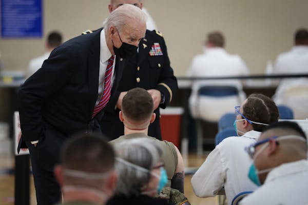 Biden tours vaccination site at Walter Reed