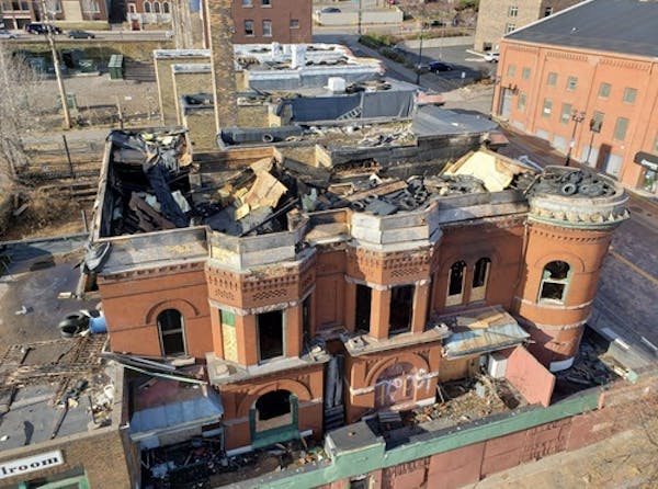 FILE-A fire in November destroyed and collapsed the roof of the Pastoret Terrace building in downtown Duluth.