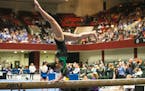 Annika Lee of Park Center competed on the balance beam at the Xcel Energy Center in St. Paul on Saturday, February 22, 2020. ] Special to the Star Tr