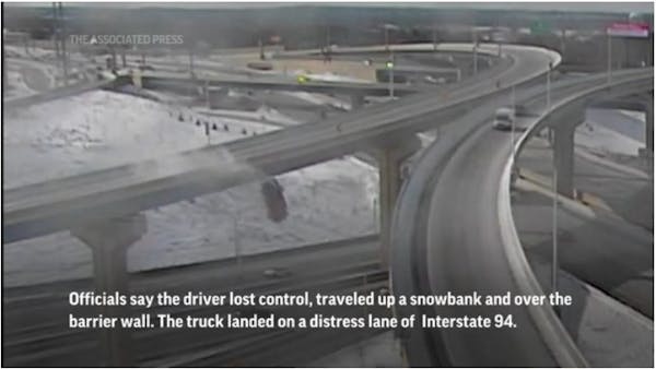 Truck plunges 70 feet off Milwaukee highway