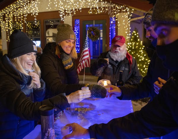 Lacey Olson, Laura Weber, Tom Vick, Christopher Vick and Jake (to come) toasted at an outdoor Ice bar at the home of ChristopherÕs parents Tom and He